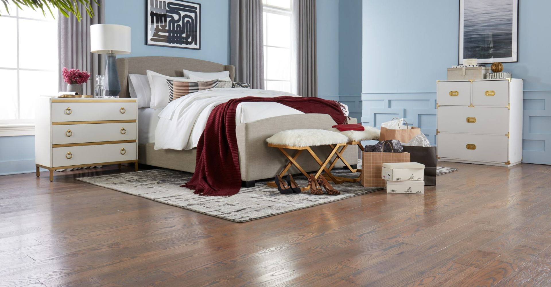 image of a dog in a field with a banner reading find flooring you'll both love, happy paws flooring